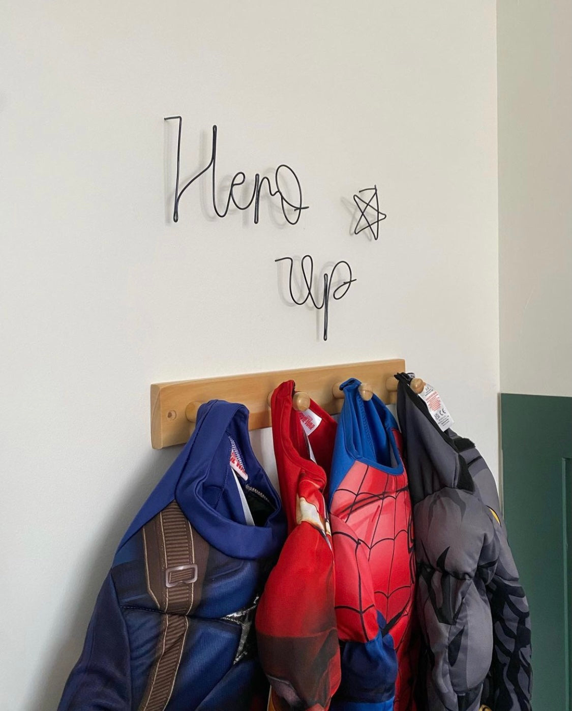 ‘Hero Up' wire sign with star